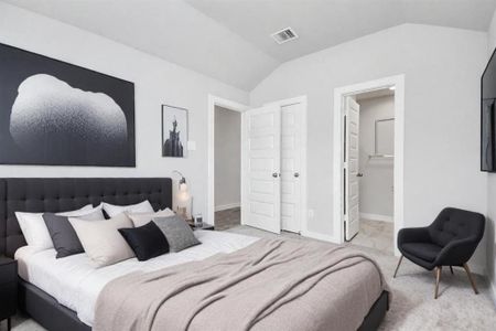 At the forefront of the home, a guest suite with its own bathroom awaits. Sample photo of completed home with similar floor plan. As-built interior colors and selections may vary.