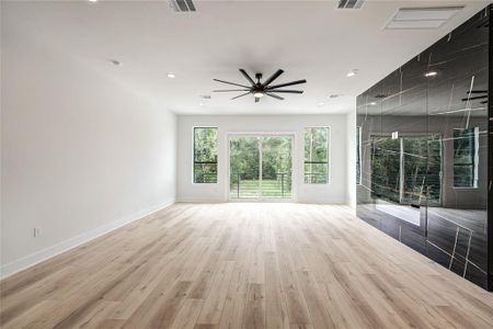 A view of the living room which has a nice balcony off of the front