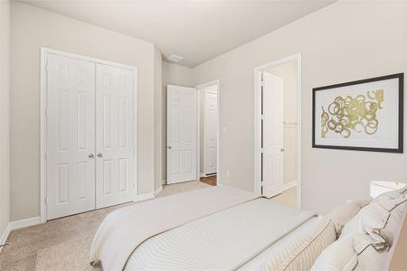 Your secondary bedroom makes for a perfect in-law suite. This room features plush carpet, fresh paint, closet, large window, and en-suite bath.