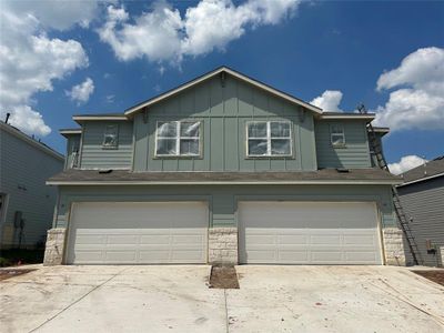 New construction Townhouse house 7208A Grenadine Bloom Bnd, Del Valle, TX 78617 - photo 0 0