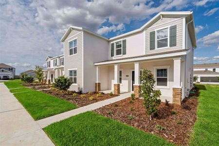 New construction Townhouse house 6080 Peaceful Park Way, Clermont, FL 34714 Landcaster- photo 1 1