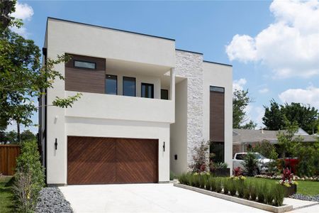Modern home featuring a garage
