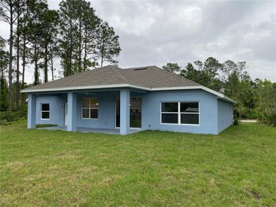 New construction Single-Family house 99 Sloganeer Trail, Palm Coast, FL 32164 - photo 4 4
