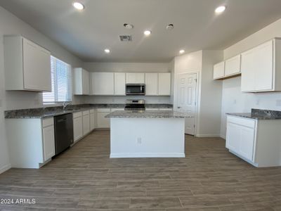 New construction Single-Family house 10810 W Luxton Lane, Tolleson, AZ 85353 - photo 19 19