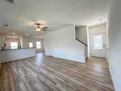 Luxury vinyl plank flooring throughout Family, Dining and Kitchen.