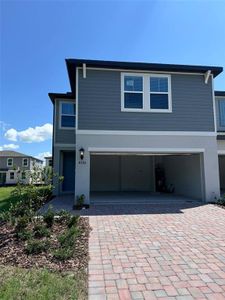 New construction Townhouse house 4330 Restful Fallow Cove, Saint Cloud, FL 34772 - photo 0