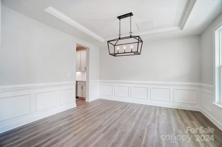 Beautiful Dining Room with upgraded lighting and colonial trim