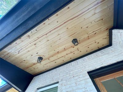 Room details featuring wooden ceiling