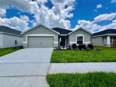 New construction Single-Family house 1969 Harrods Place, Haines City, FL 33844 - photo 0