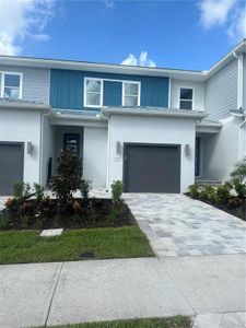 New construction Townhouse house 7834 Spectrum Drive, Kissimmee, FL 34747 - photo 0