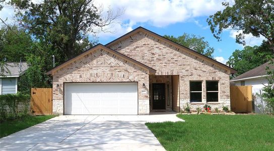 Front view of home and double wide driveway.