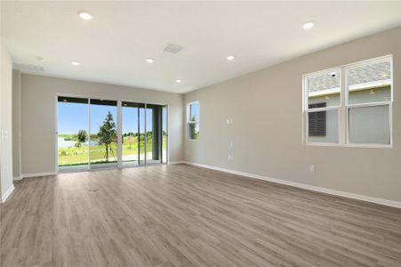 New construction Single-Family house 912 Griffon Avenue, Lake Alfred, FL 33850 Slate- photo 1 1
