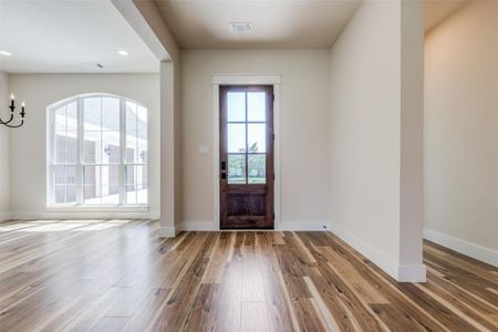 Entryway with luxury vinyl wood-style flooring