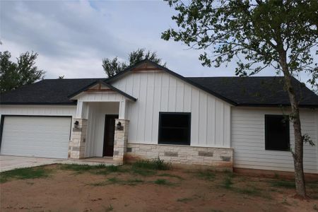 New construction Single-Family house 129 Waimanalo Dr, Bastrop, TX 78602 - photo 0