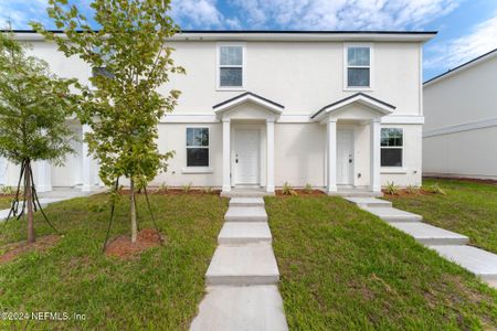 New construction Townhouse house 8506 Mcgirts Village Lane, Jacksonville, FL 32210 - photo 0