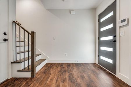 Entryway with a Contemporay Wood Door