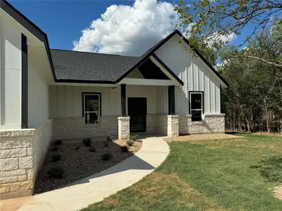 New construction Single-Family house 142 Waikakaaua Dr, Bastrop, TX 78602 - photo 0