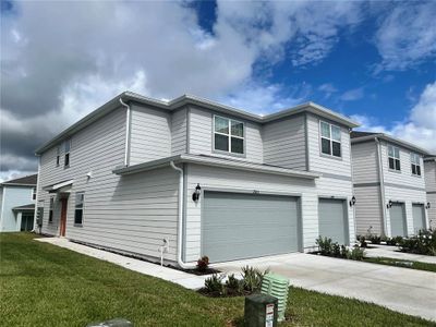 New construction Townhouse house 2603 Winsome Way, Davenport, FL 33896 - photo 0