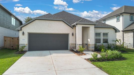 Upon arrival to this STUNNING home, elegance greets you prior to entry with a welcoming walkway to the private front entryway, beautiful brick & stone elevation and abundance of greenspace.