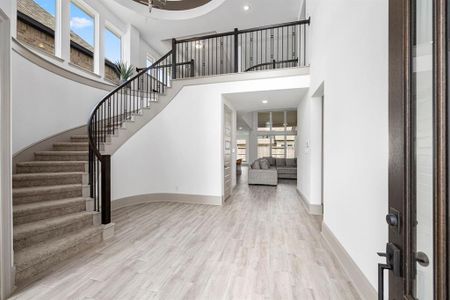 This dramatic entry will greet your guests as they enter your new home.  There is an office space to the left of this picture.