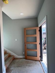 Foyer featuring hardwood / wood-style flooring