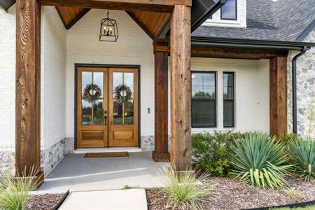 Property entrance with french doors