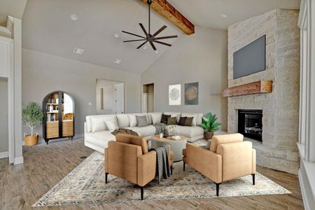 Living room with beamed ceiling, high vaulted ceiling, ceiling fan, a stone fireplace, and hardwood / wood-style flooring