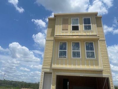 Three-story home with 3 bedrooms, 3.5 bath and 2 car garage