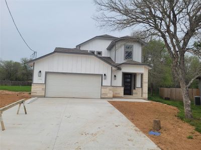 New construction Single-Family house 122 W Kikipua Ln, Bastrop, TX 78602 - photo 0