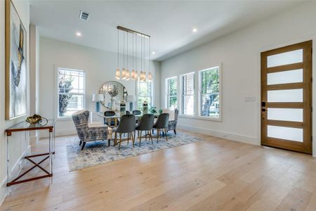 dining room with designer chandlier