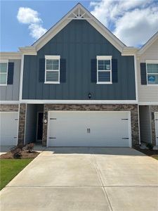 New construction Townhouse house 11655 Chatham Drive, Lovejoy, GA 30228 - photo 0