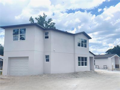 New construction Single-Family house 495 Dean Creek Lane, Orlando, FL 32825 - photo 1 1