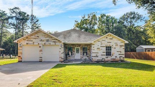 New construction Single-Family house 247 County Road 3669 B, Splendora, TX 77327 - photo 0