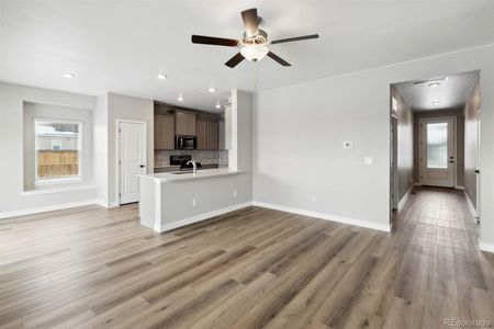 New construction Single-Family house 9451 Yampa Court, Commerce City, CO 80022 - photo 4 4