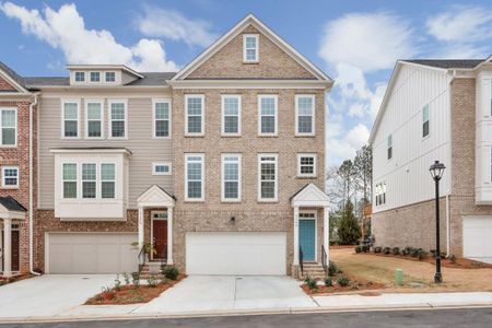 New construction Townhouse house 1149 Caruso Drive, Buford, GA 30518 - photo 0