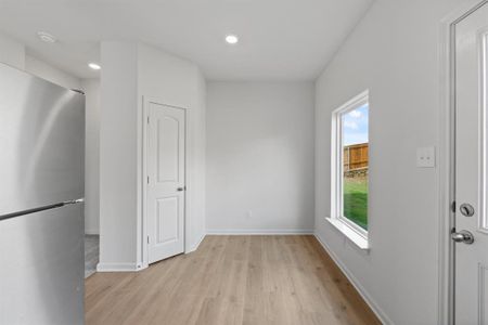 Dining Area with wood-style floors