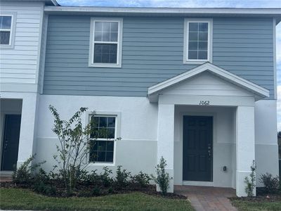 New construction Townhouse house 1062 Sand Torch Circle, Davenport, FL 33837 - photo 0