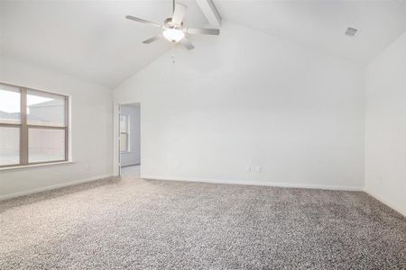 Carpeted spare room with high vaulted ceiling, beam ceiling, and ceiling fan