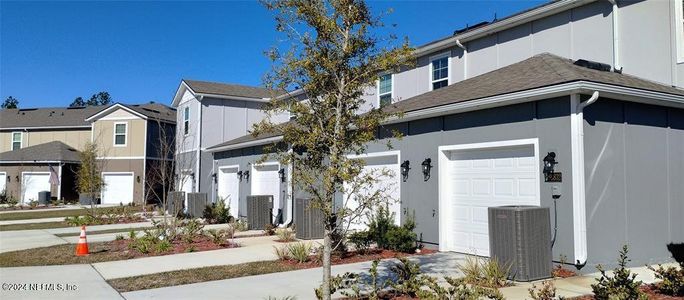 New construction Townhouse house 86824 Shortline Circle, Yulee, FL 32097 - photo 0