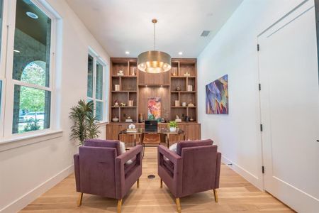 Living area featuring light hardwood / wood-style flooring