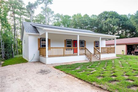 New construction Single-Family house 15558 Arrowhead Loop, Willis, TX 77378 - photo 0