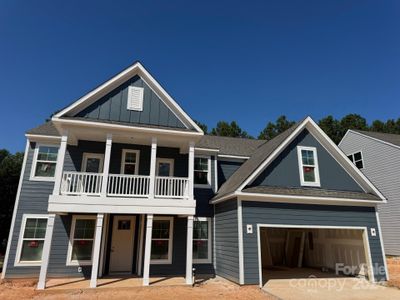 Homesite 10 features a Charleston F floorplan with double front porch.