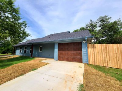 Single story home with a garage