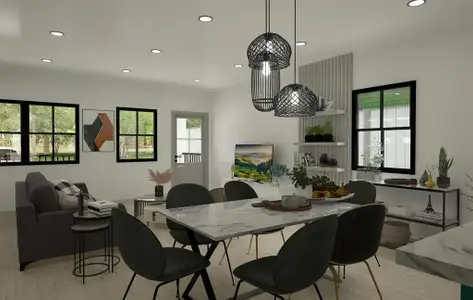 Dining area with ornamental molding and light hardwood / wood-style floors