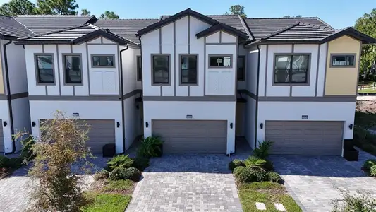 New construction Townhouse house 10430 Ebb Tide Lane, Orlando, FL 32821 - photo 0