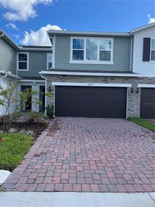 New construction Townhouse house 4827 Noble Cypress Street, Kissimmee, FL 34746 Powell- photo 0