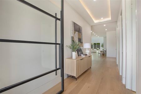 Hall featuring light hardwood / wood-style flooring