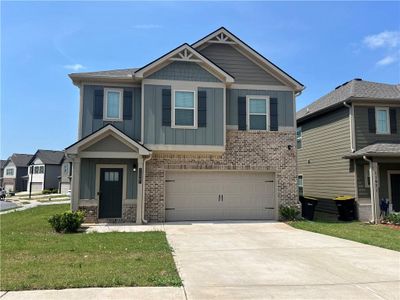 New construction Single-Family house 11967 Brightside Parkway, Hampton, GA 30228 - photo 0