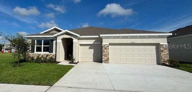 New construction Single-Family house 10270 Bridgegate Heights Loop, San Antonio, FL 33576 - photo 0