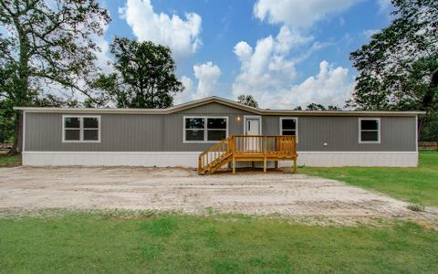 New construction Single-Family house 148 County Road 328, Cleveland, TX 77327 - photo 0 0